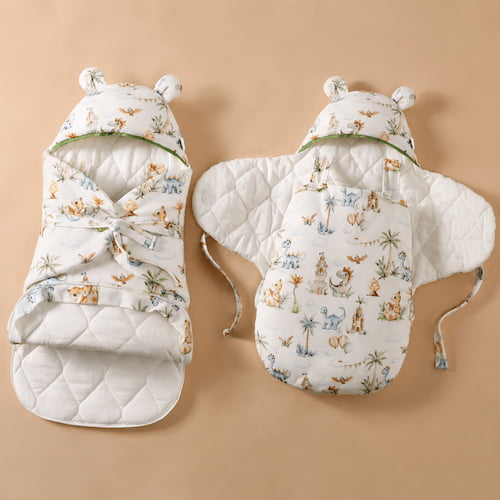 fermeture de nid d ange par rabats croises et liens a nouer pour maintenir bebe confortablement enveloppe
