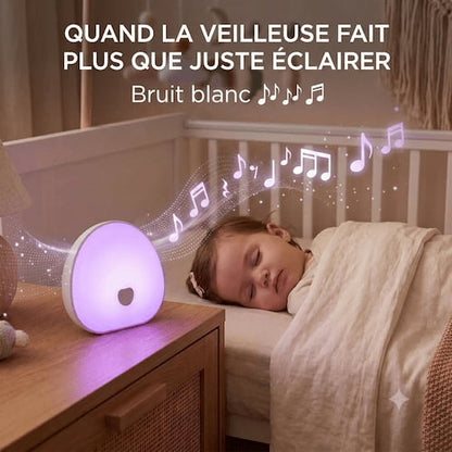 veilleuse musicale pour bebe lumineuse violet avec music bruit blanc sur table de nuit